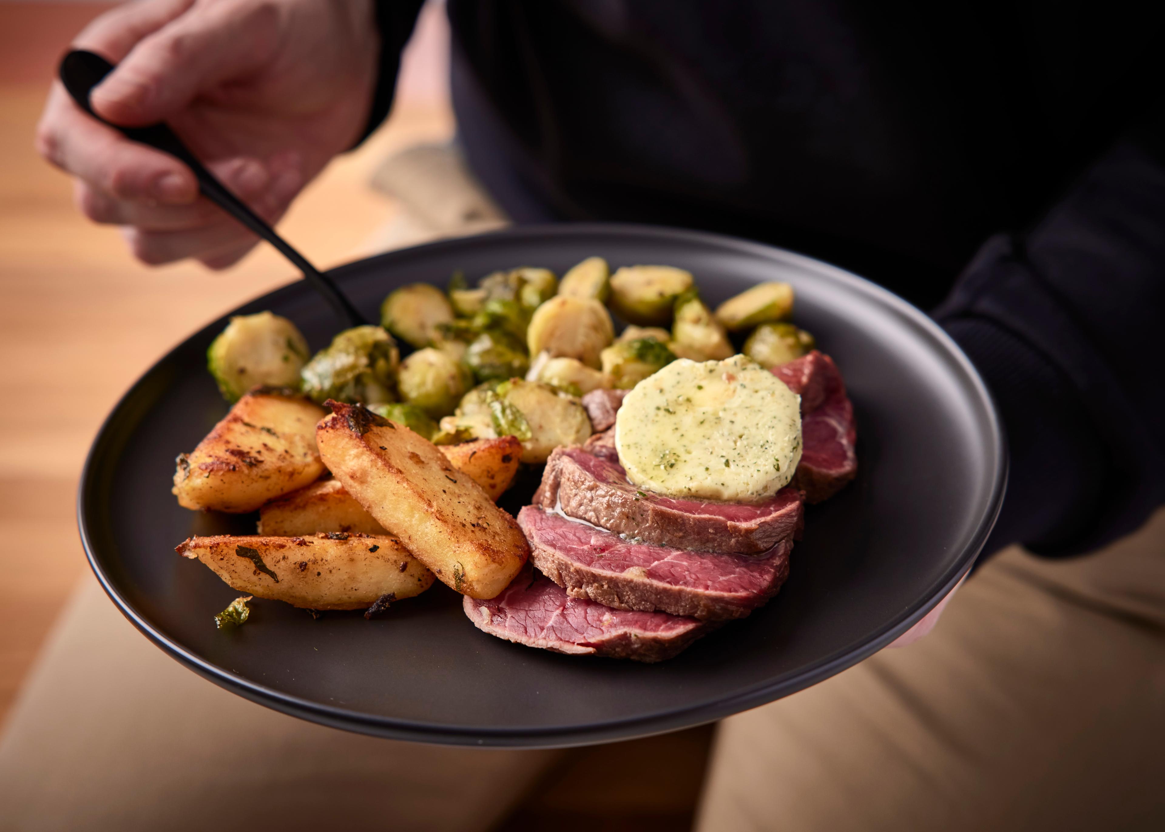 Steak de boeuf au beurre à l'ail & fines herbes