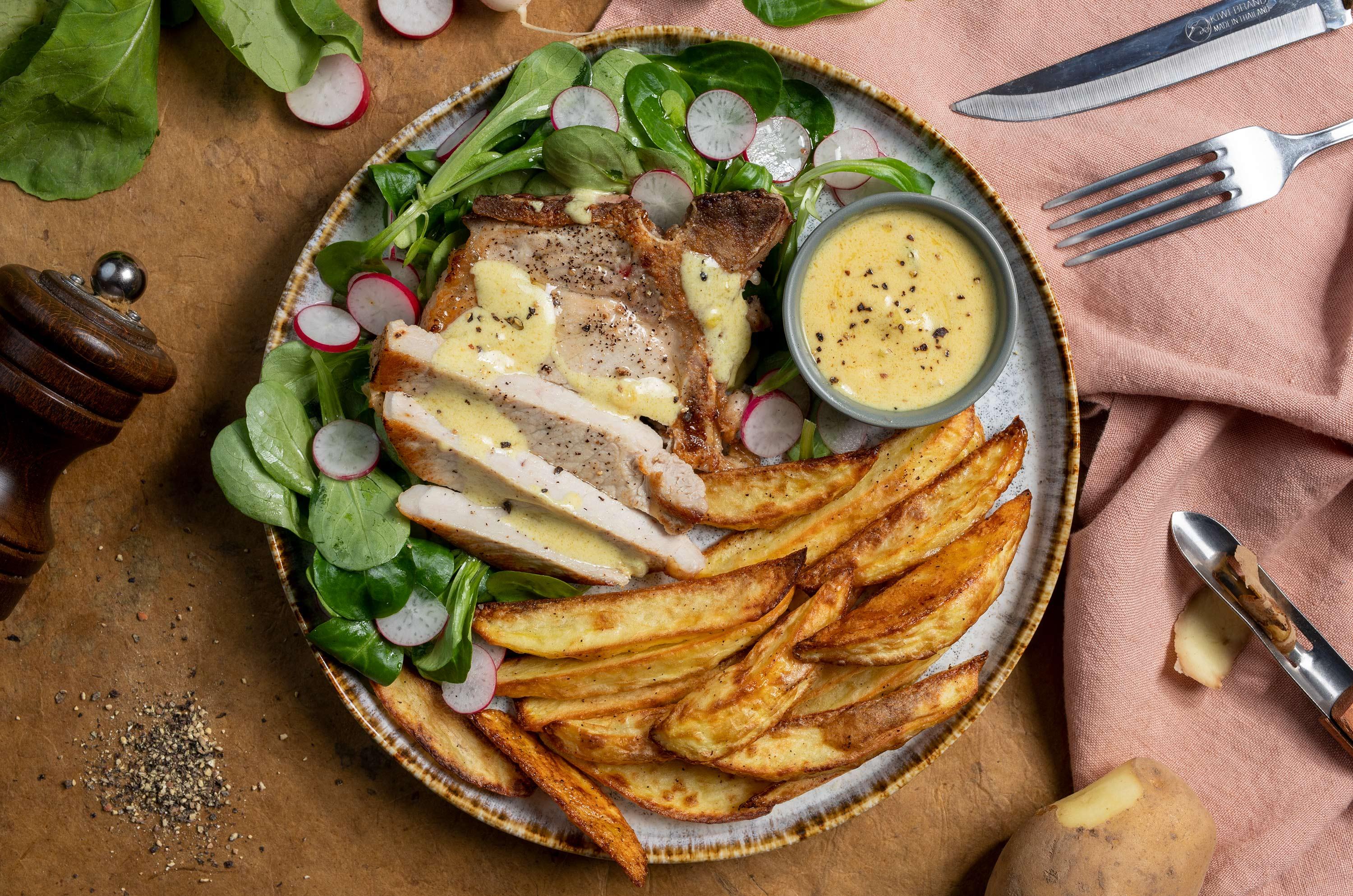 Acheter Spiringue de porc à la sauce au poivre et frites